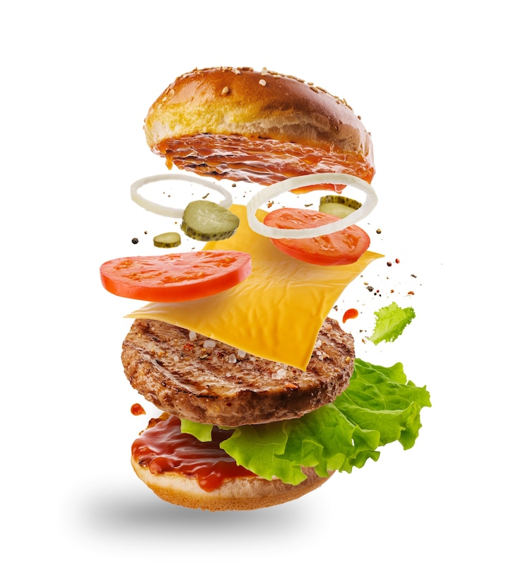 Foto burger con elementi volanti