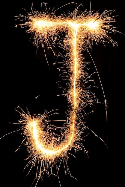 Burning Sparkling numero 0 zero isolato su sfondo nero Bellissimo elemento di design luminoso per il volantino delle vacanze di biglietti di auguri