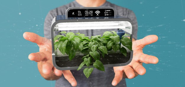 Businesmann che tiene collegato un impianto vegetale digitale