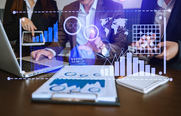 Business team hands working with provide information for Key Performance Indicators and marketing analysis onn virtual computer xA
