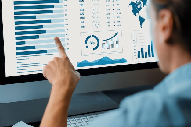 Businessman calling for consulting business pointing on pc pecuniary