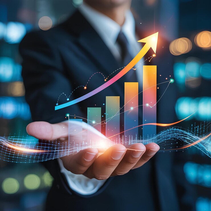 Businessman holding growing graph with upward arrow