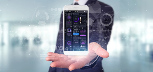 Businessman holding Smartphone with user interface data on the screen 