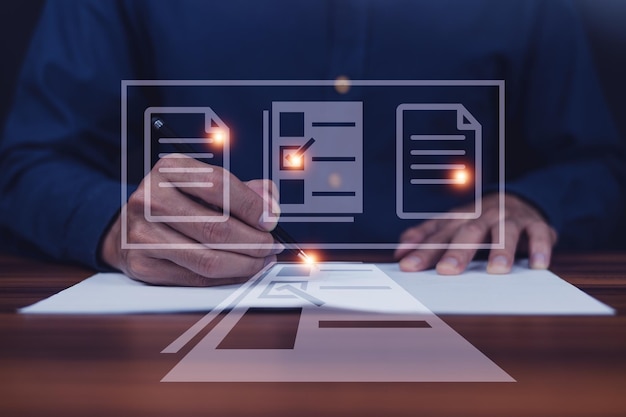 businessman using computer document management system dms online documentation database process automation to efficiently manage files