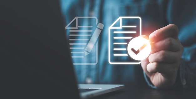 businessman using electronic pen sign tick mark on virtual document for online approve paperless quality assurance and erp management prepare check and approve concept
