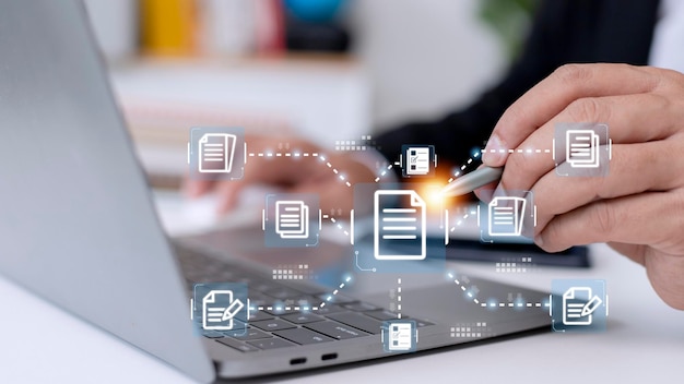 Businessman working with electronics document icons Edocument management online documentation database paperless office concept