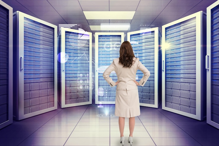 Photo businesswoman standing back to camera against futuristic technology interface