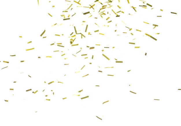 Cadute di confetti dorati spruzzate nell'aria esplosioni di confetti d'oro che volano volano nuvole astratte molti luccichi di festa sparsi in molti gruppi sfondo bianco isolato