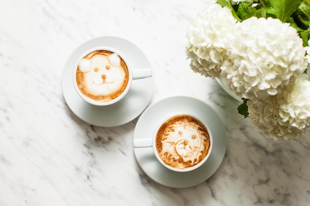 Caffè Latte art - museruole di orso e leone