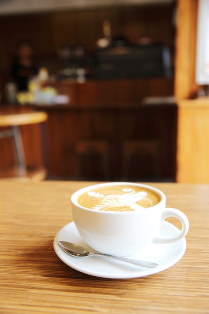 Caffè su fondo di legno