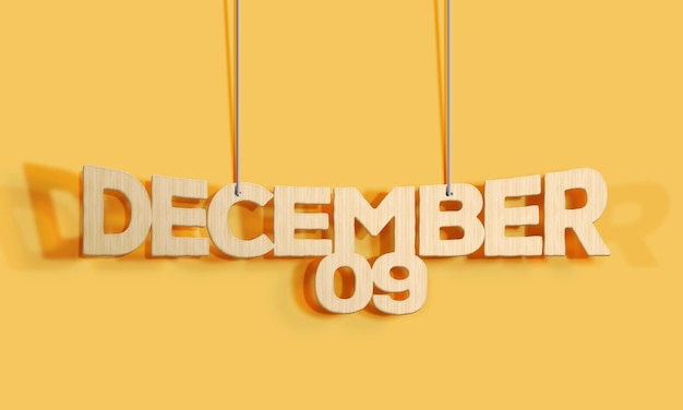 Calendario 3D in legno con scritta decorativa a forma d'attaccatura per dicembre 09 su sfondo giallo