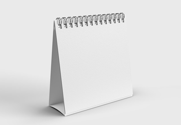calendario da scrivania di carta bianca su sfondo bianco per il mockup