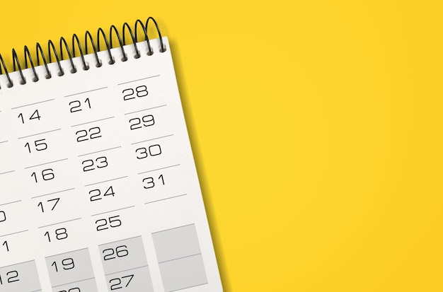 Calendario pulito bianco su sfondo giallo pieno con spazio per la copia, programma di riunioni di lavoro,