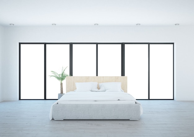 Camera bianca con cuscini da letto e ampie finestre