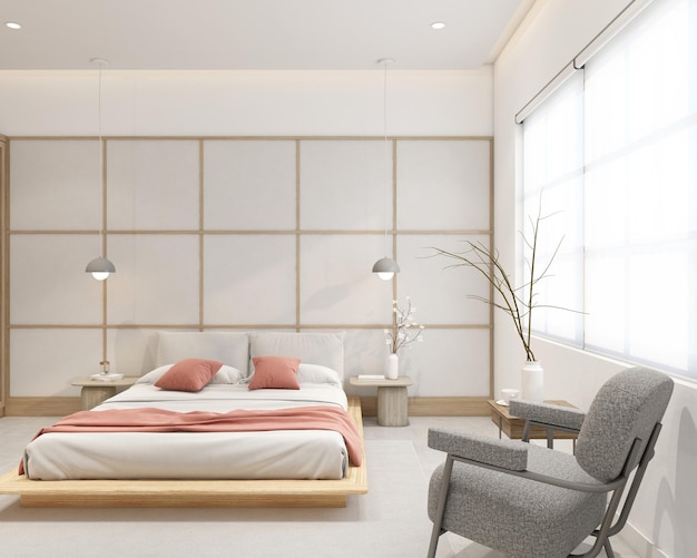 Camera da letto moderna in stile giapponese decorata con pareti in tessuto bianco e poltrona con lampada a sospensione minimalista