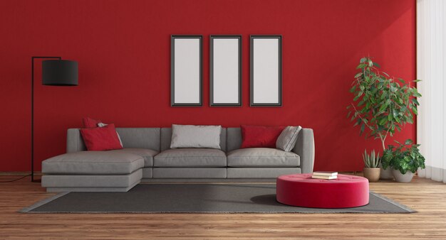 Camera rossa moderna con divano grigio
