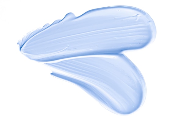 Campione di bellezza blu pastello per la cura della pelle e il trucco cosmetico campione texture isolato su sfondo bianco trucco sbavature crema cosmetici macchia o pennellata