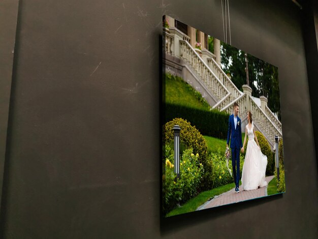 Campione di fotografia con tratto galleria su telaio in legno. Foto di matrimonio stampata su tela