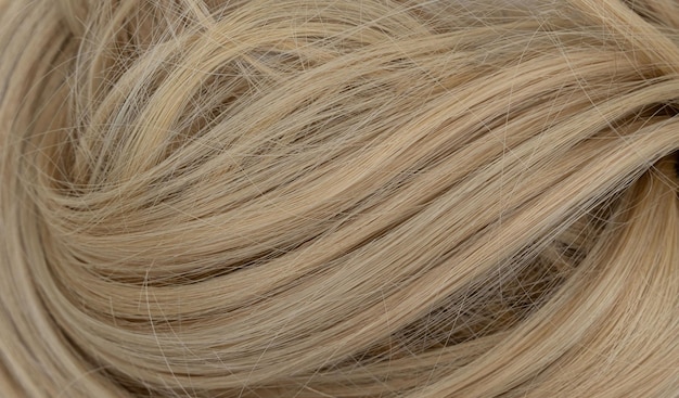 Capelli lucidi sfondo texture astratta capelli biondi Foto di alta qualità