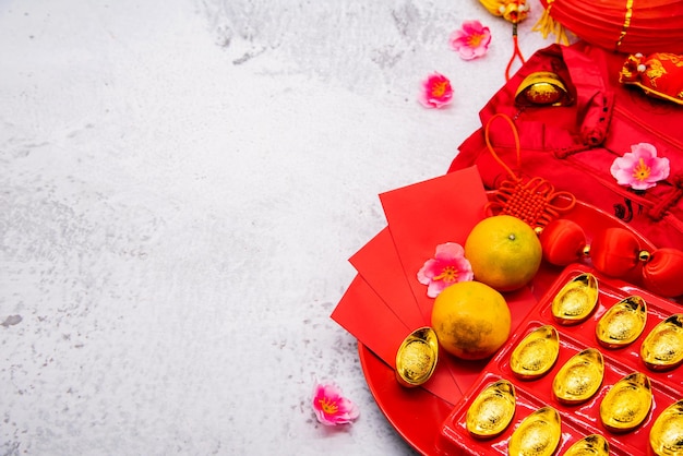Capodanno cinese, lingotti d'oro cinesi, stile tradizionale asiatico (il testo straniero significa benedizione e fortuna)