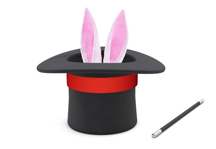 Foto cappello da mago. le orecchie di coniglio sporgono con un cappello a cilindro nero con un nastro rosso e una bacchetta magica. isolato su sfondo bianco. rendering 3d.