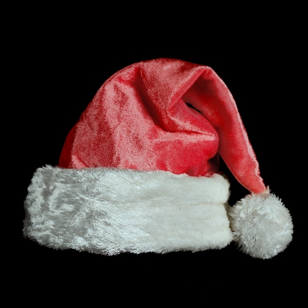 Cappello di Babbo Natale di Natale isolato sul nero