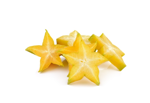 Carambole della frutta della stella sulla parete bianca