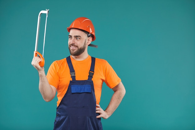 Carpenter Looking At Bow Saw