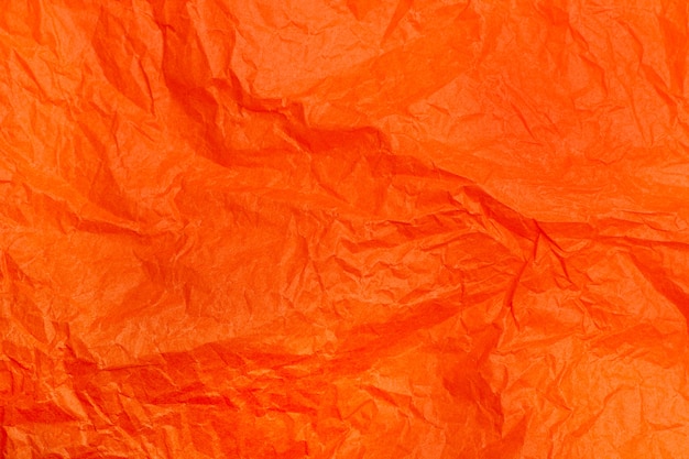 Carta spiegazzata arancione in una vista ravvicinata