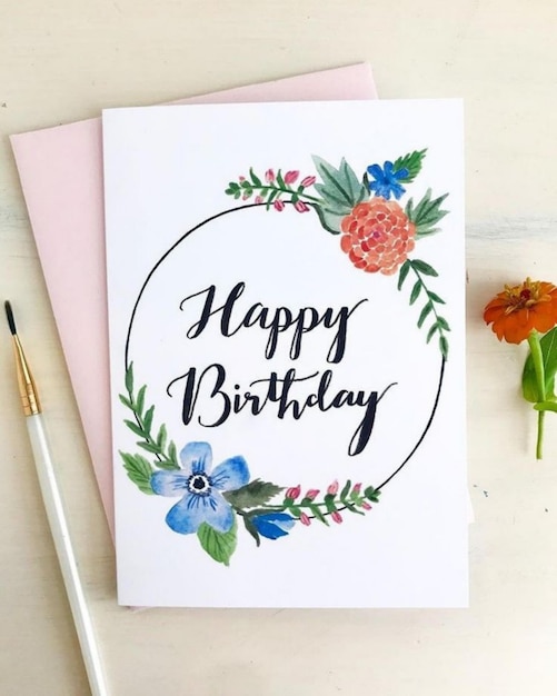 Cartella di auguri di compleanno con fiori ad acquerello