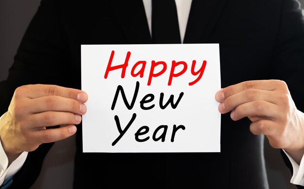 Cartella di Natale con messaggio Buon anno nuovo sulla lettera isolata su bianco