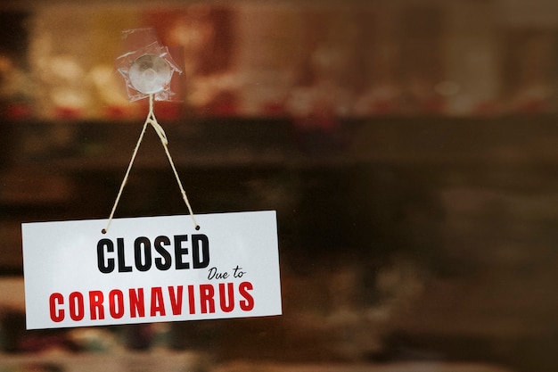 Cartello negozio chiuso a causa della pandemia di coronavirus