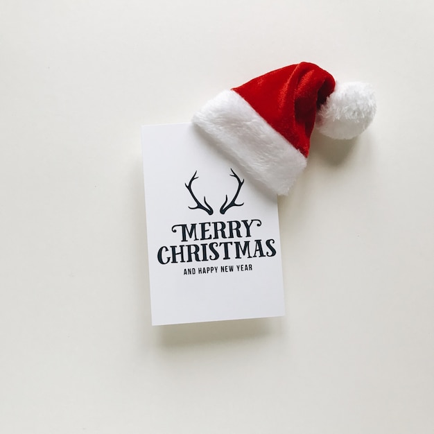 cartoline di composizione di Natale e cappello santa