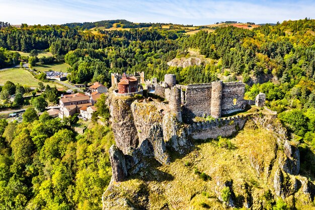Castle of Arlempdes on top of a basalt rock at a meander of the Loire river. Haute-Loire, France