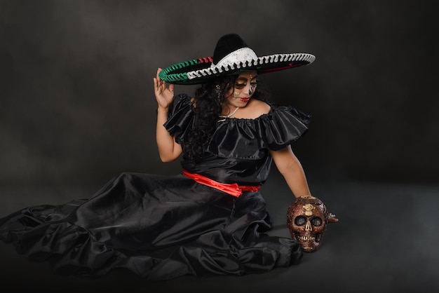 Catrina indossa un cappello mariachi con i colori della bandiera messicana Celebrazione del giorno dei morti