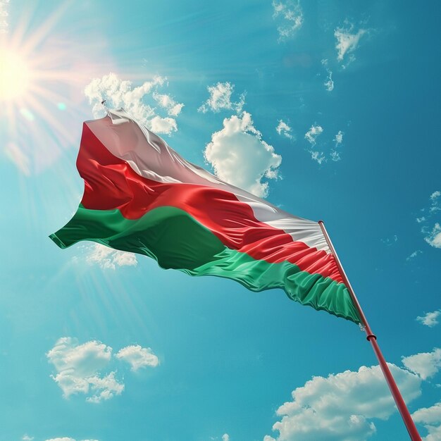 Celebrazione della Giornata della Bandiera Nazionale Bandiera bielorussa che sventola in alto nel cielo