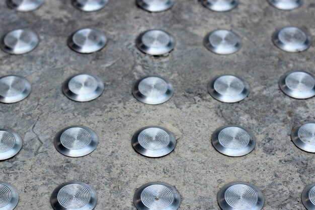 Cement fllor with tactile ground surface indicators