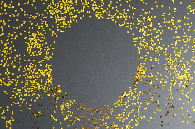 Foto cerchio di stelle glitter oro su sfondo nero
