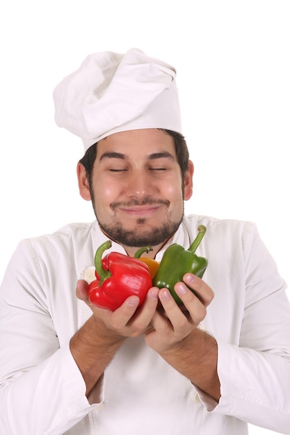 Chef che sente l'aroma dei peperoni