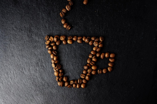 Chicchi di caffè a forma di tazza