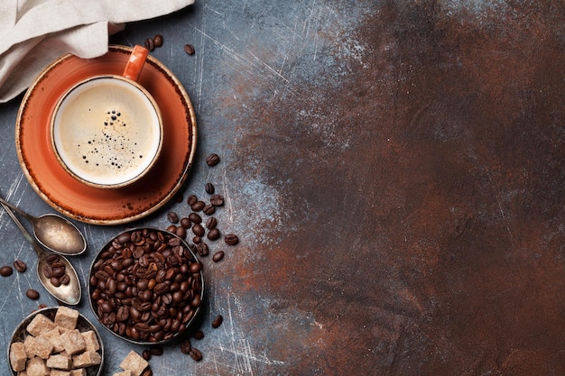 Chicchi e zucchero della tazza di caffè