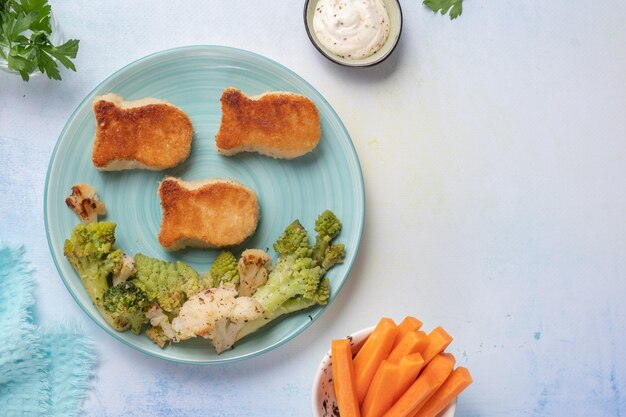 Cibo per bambini pepite a forma di pesce con verdure