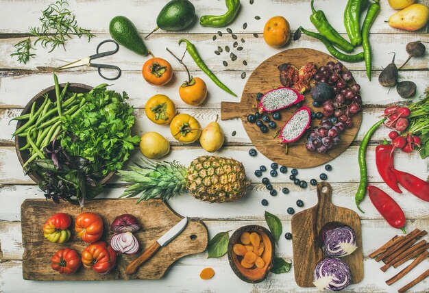 Cibo vegano Helathy che cucina sfondo con frutta e verdura