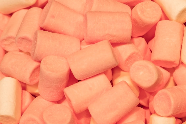 Cilindro a forma di marshmallow rosa.