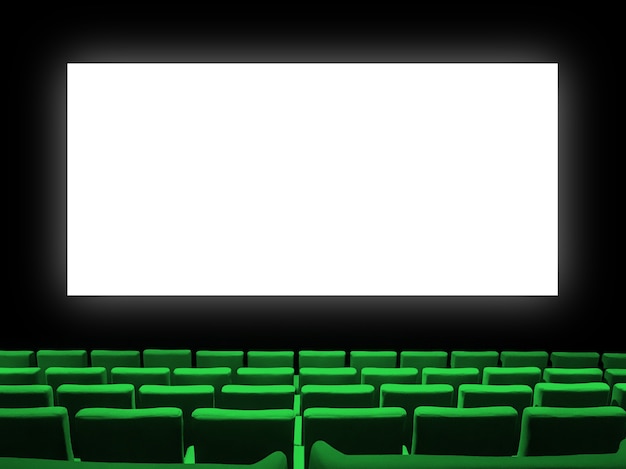 Cinema cinema con sedili di velluto verde e uno schermo bianco vuoto