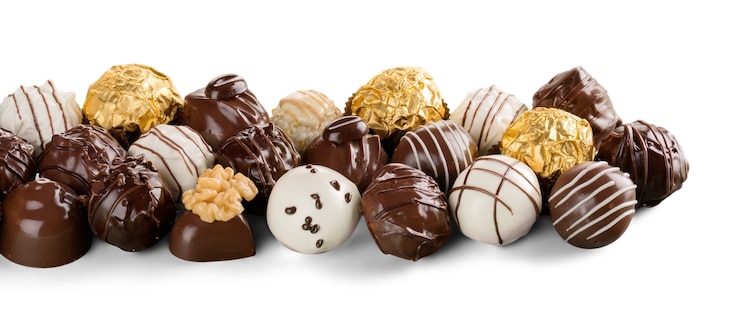 Foto cioccolato fondente e al latte, praline, tartufi, assortiti