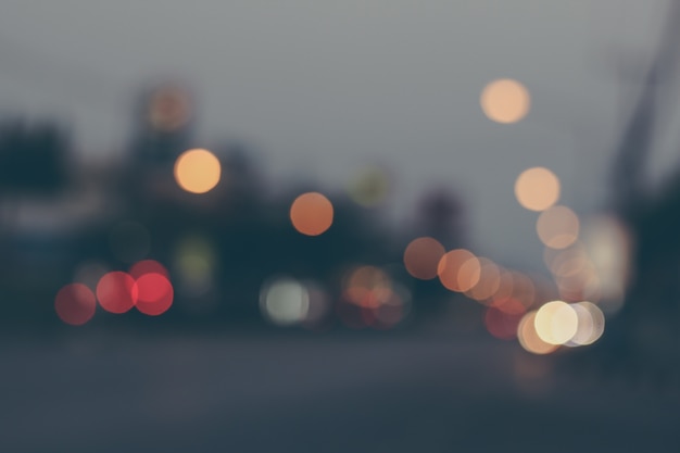 Città defocused astratta di Bokeh sulla strada