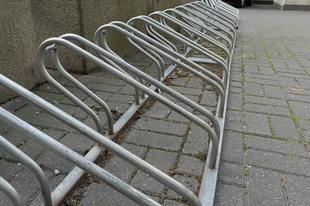 City Bicycle Parking New Bike Station Metal Shiny Modern Bike Storage Security Concept Empty Street Bicycle Parking Cycling Infrastructure