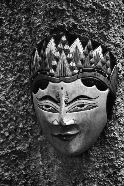 Close-up della statua di Buddha contro il muro