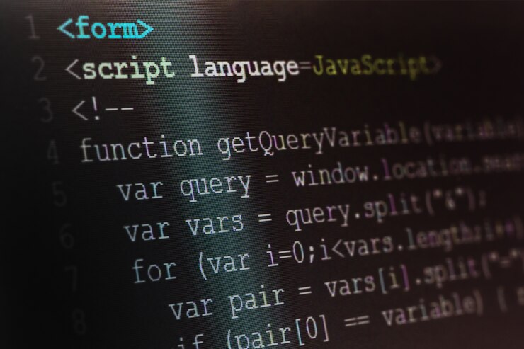Photo close up macro shot selective focus of java script programming language on computer